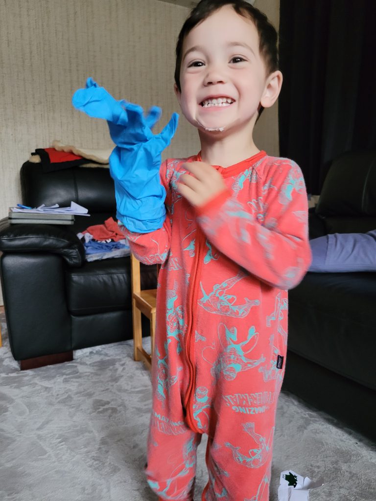 Rahim Changing Aisha's Nappy - Getting Ready