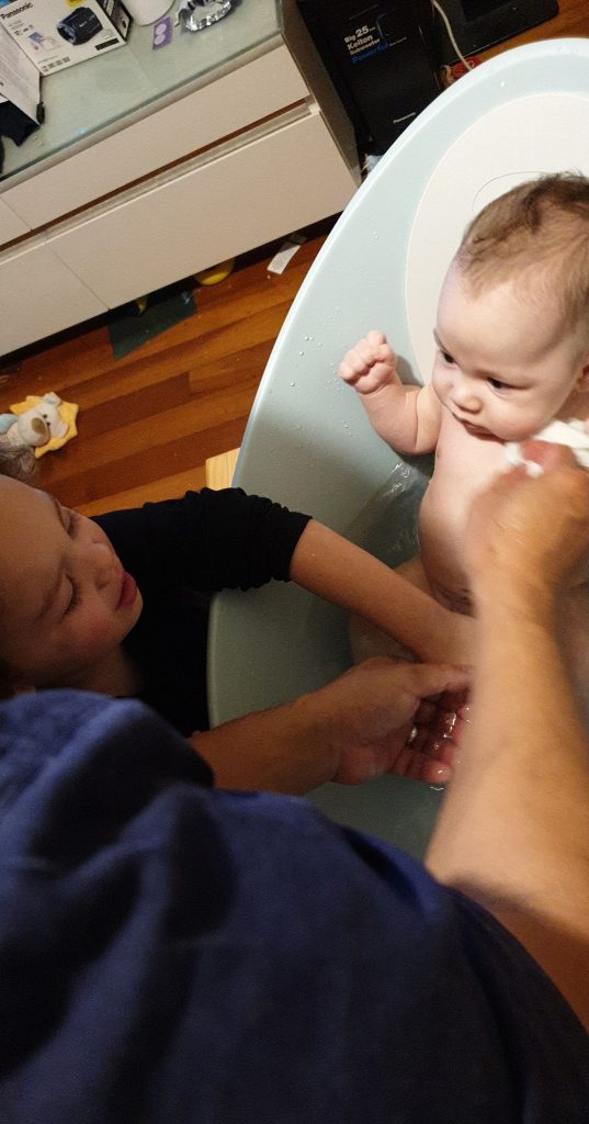 Helping with bathtim